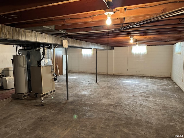 845 E Main St, Havana, IL 62644 - below grade area featuring water heater and heating unit