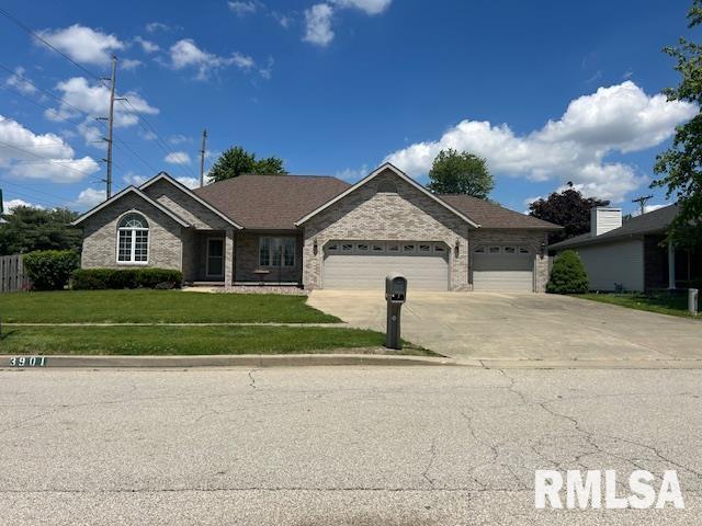 3901 Destiny Dr, Springfield, IL 62707 - ranch-style house with an attached garage, concrete driveway, and a front yard
