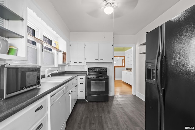 kitchen featuring black appliances, open shelves, a sink, white cabinets, and dark wood-style floors
