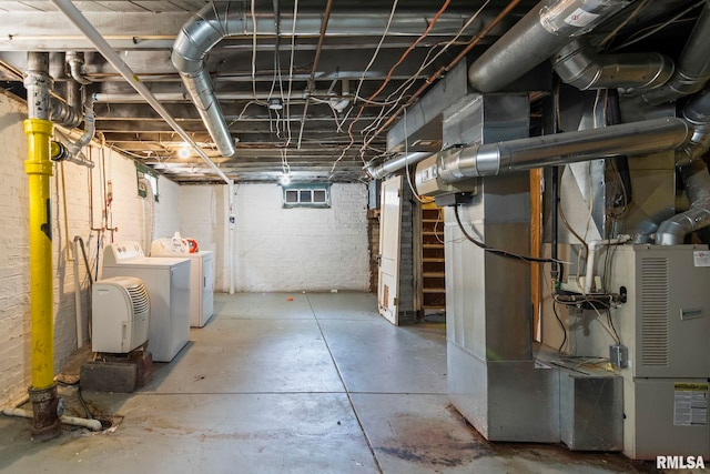 basement with washing machine and dryer