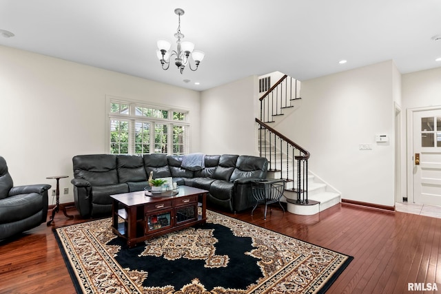 living area featuring a chandelier, stairway, hardwood / wood-style floors, baseboards, and recessed lighting
