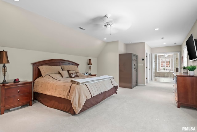 bedroom featuring light carpet, recessed lighting, ensuite bathroom, a ceiling fan, and lofted ceiling