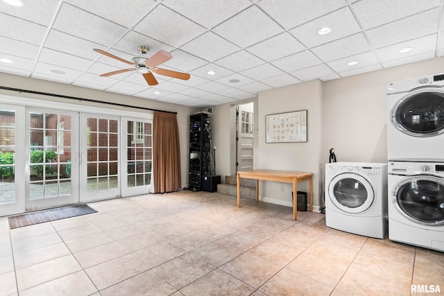 laundry room featuring a ceiling fan, stacked washing machine and dryer, light tile patterned flooring, washer and clothes dryer, and recessed lighting