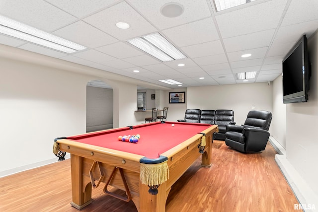 playroom with light wood finished floors, baseboards, billiards table, arched walkways, and recessed lighting
