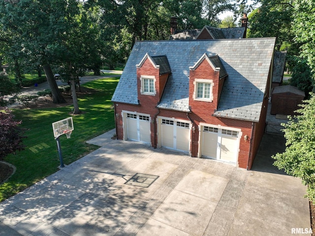 garage featuring driveway and an AC wall unit