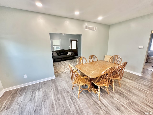 103 N Ohio Ave, Abingdon, IL 61410 - dining area with light wood-style floors, baseboards, and recessed lighting
