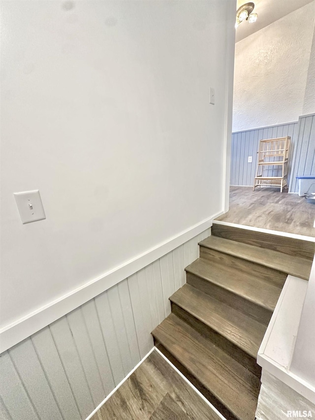103 N Ohio Ave, Abingdon, IL 61410 - stairs with wood finished floors and wainscoting