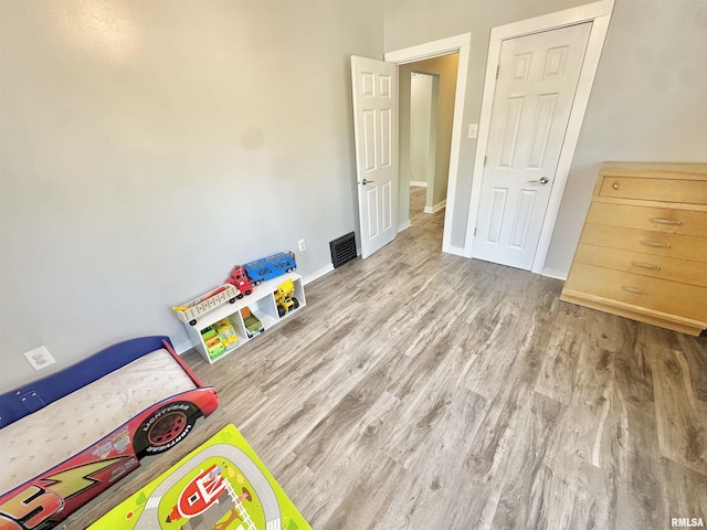 103 N Ohio Ave, Abingdon, IL 61410 - bedroom with wood finished floors and baseboards