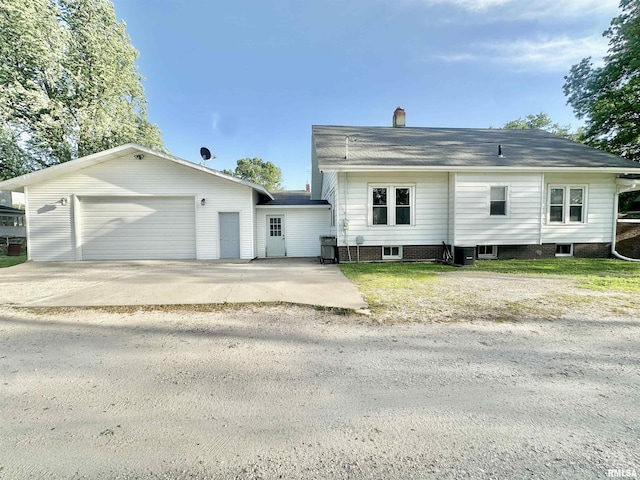 103 N Ohio Ave, Abingdon, IL 61410 - view of front of house with a chimney and a garage