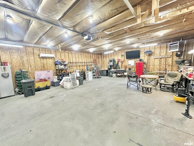 103 N Ohio Ave, Abingdon, IL 61410 - garage featuring a workshop area and a garage door opener