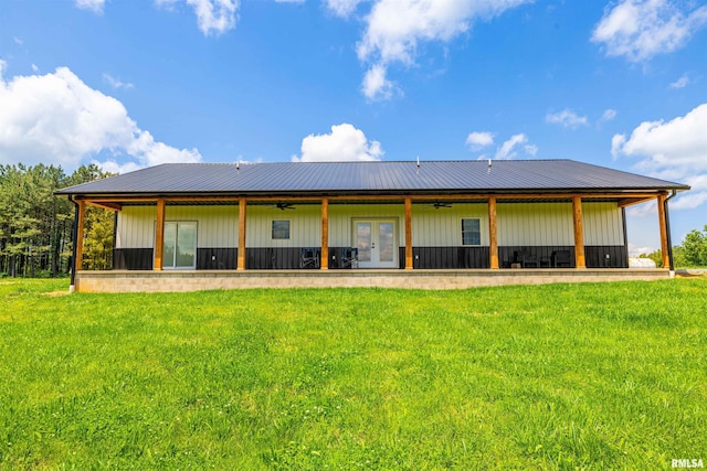 142 Oak Rd, Harrisburg, IL 62946 - rear view of house with a ceiling fan, a lawn, and french doors