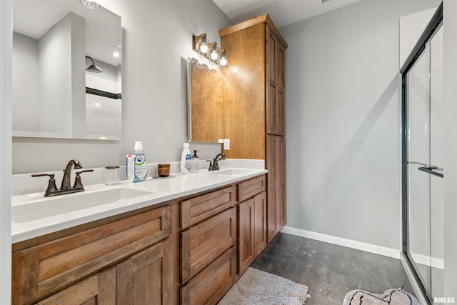 142 Oak Rd, Harrisburg, IL 62946 - full bathroom with a tile shower, concrete flooring, double vanity, and baseboards