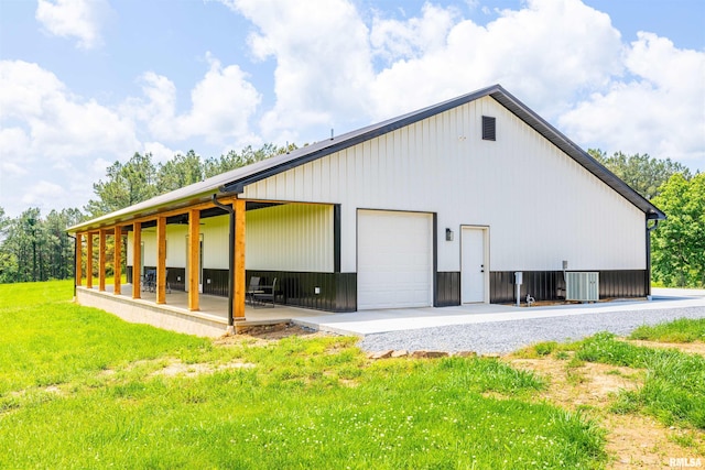 142 Oak Rd, Harrisburg, IL 62946 - view of outdoor structure featuring cooling unit and an outbuilding