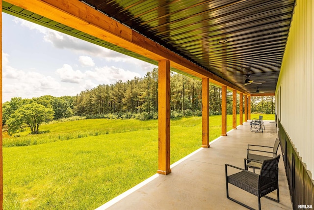 142 Oak Rd, Harrisburg, IL 62946 - view of patio / terrace with ceiling fan and a forest view