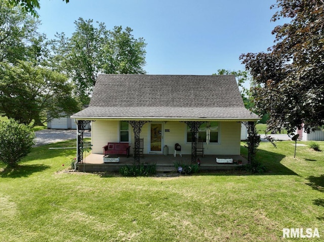 7059 Midway Rd, Metropolis, IL 62960 - view of front of house with covered porch, a front lawn, and a shingled roof