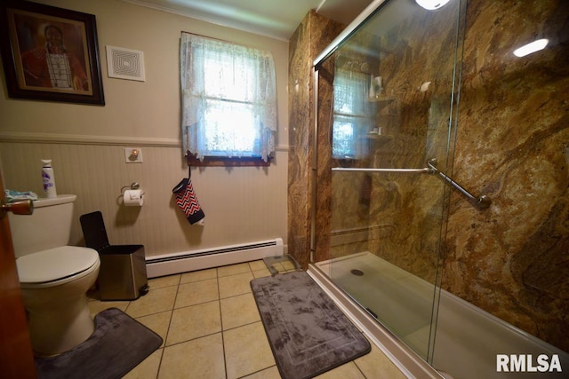 7059 Midway Rd, Metropolis, IL 62960 - bathroom with baseboard heating, a shower stall, tile patterned floors, wainscoting, and toilet