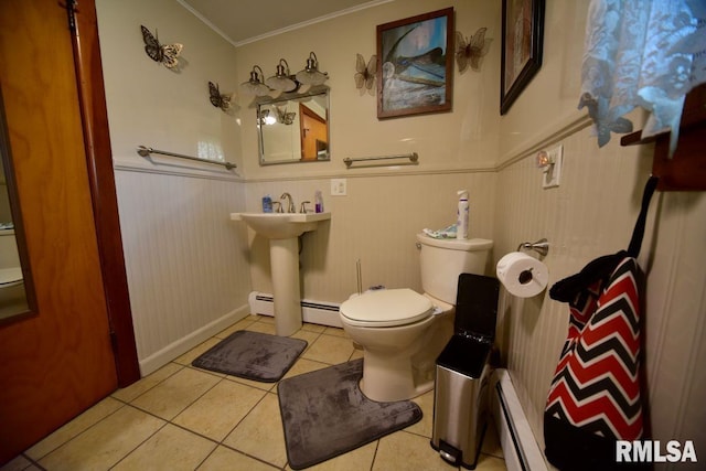 7059 Midway Rd, Metropolis, IL 62960 - bathroom featuring tile patterned flooring, toilet, crown molding, wainscoting, and a baseboard heating unit