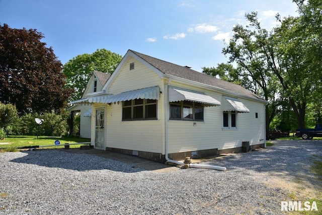 7059 Midway Rd, Metropolis, IL 62960 - view of side of home with crawl space and roof with shingles