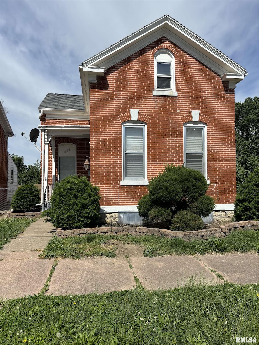 606 S 6th St, Quincy, IL 62301 - view of side of property featuring brick siding