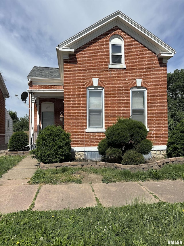 606 S 6th St, Quincy, IL 62301 - view of side of property featuring brick siding