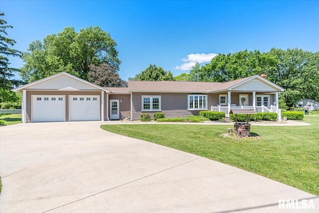 4157 N Walnut Street Rd, Springfield, IL 62707 - single story home with concrete driveway, a porch, an attached garage, and a front yard