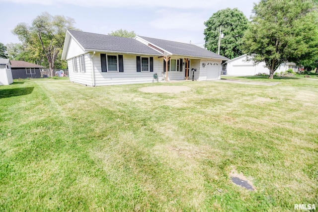 206 W N St, Assumption, IL 62510 - ranch-style house featuring an attached garage, a front lawn, and a shingled roof