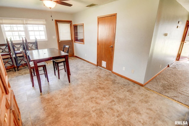 206 W N St, Assumption, IL 62510 - dining room with a ceiling fan and baseboards