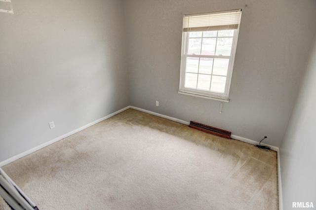 206 W N St, Assumption, IL 62510 - carpeted empty room featuring baseboards