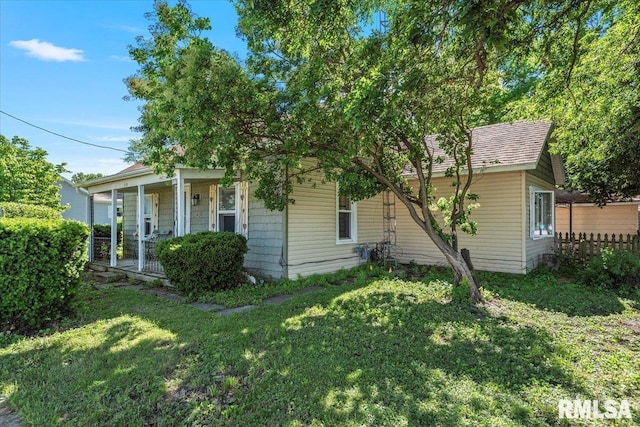 213 W St, Franklin, IL 62638 - view of front of property with a front yard and covered porch