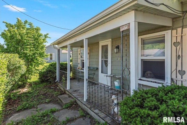 213 W St, Franklin, IL 62638 - doorway to property featuring a porch