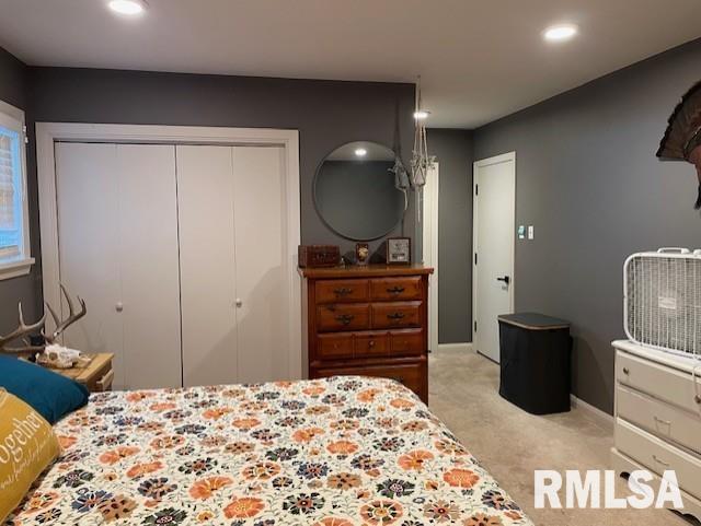 413 W Grant St, Pittsfield, IL 62363 - bedroom featuring light colored carpet, recessed lighting, and a closet