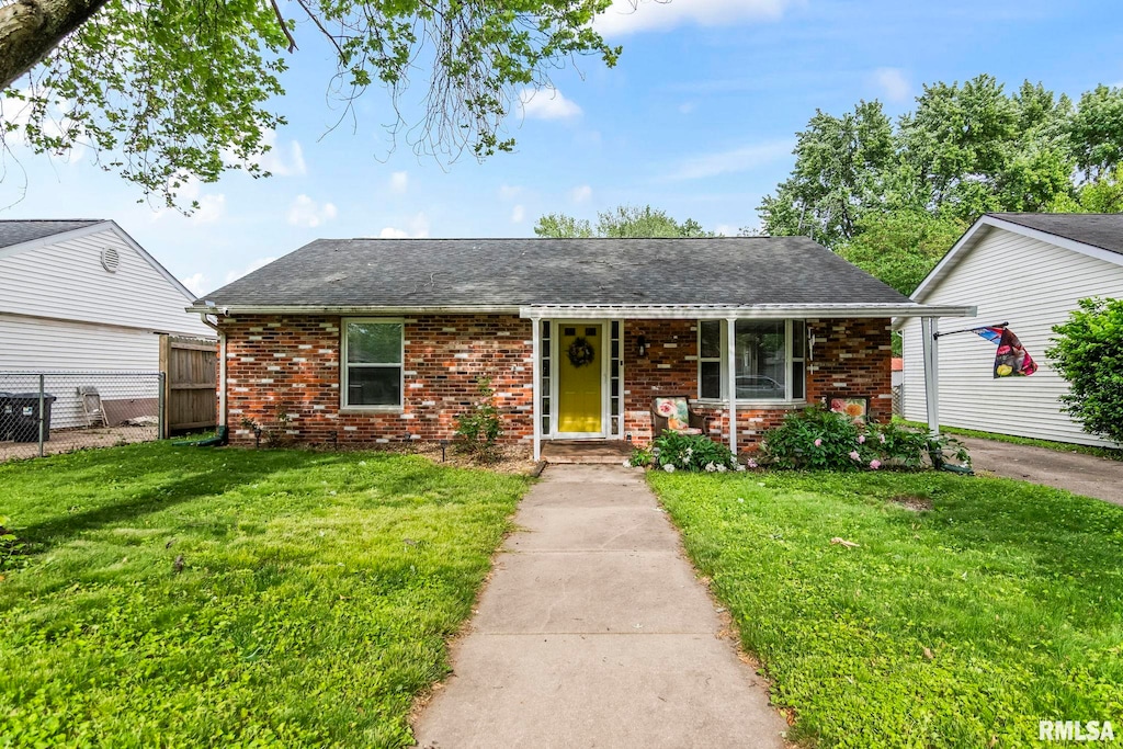 1844 Stanhope Rd, Springfield, IL 62702 - view of front facade with brick siding, a shingled roof, and covered porch