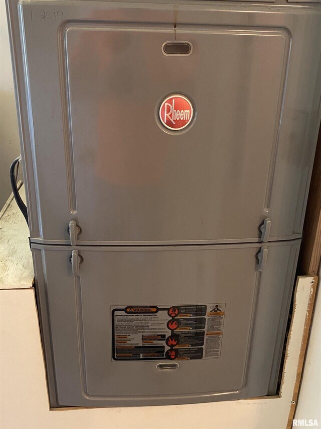 107 Locust Rd, Meredosia, IL 62665 - utility room featuring heating unit