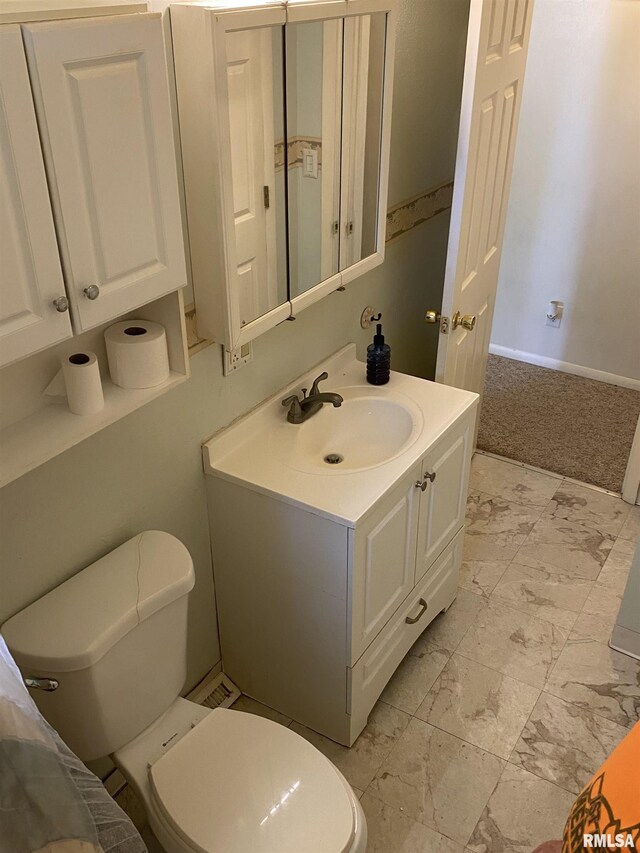 107 Locust Rd, Meredosia, IL 62665 - bathroom featuring toilet and vanity