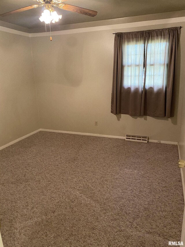 107 Locust Rd, Meredosia, IL 62665 - carpeted empty room featuring a ceiling fan and baseboards