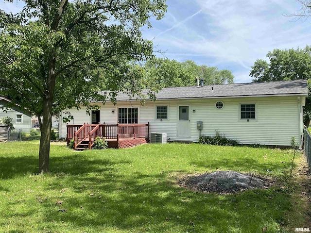 107 Locust Rd, Meredosia, IL 62665 - rear view of property with a wooden deck and central AC