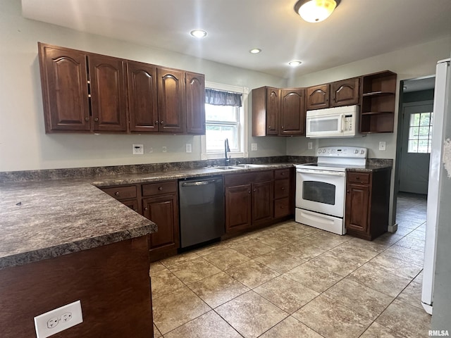 335 E S St, Mendon, IL 62351 - kitchen featuring white appliances, dark countertops, open shelves, a sink, and recessed lighting