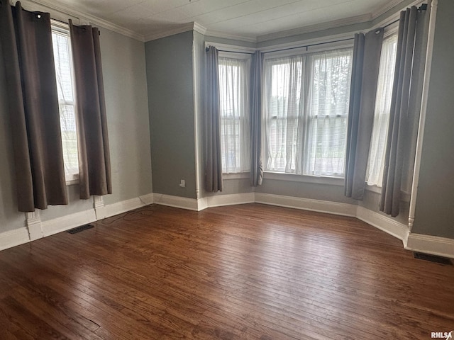 335 E S St, Mendon, IL 62351 - unfurnished room with dark wood finished floors, ornamental molding, and baseboards