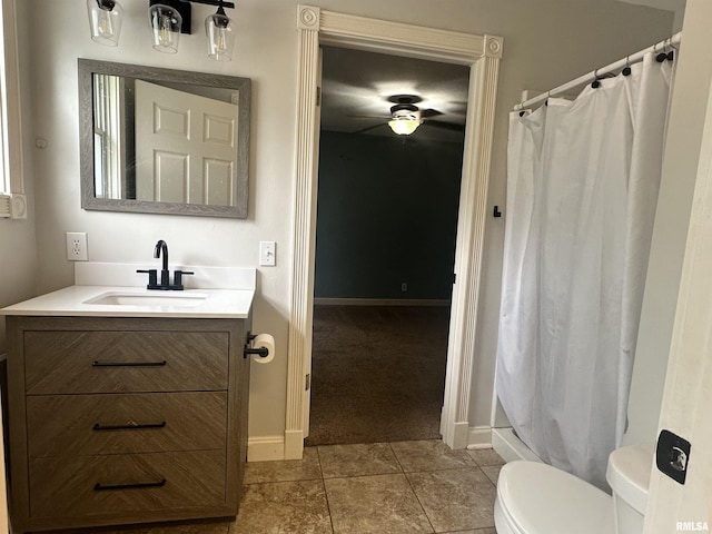 335 E S St, Mendon, IL 62351 - full bathroom with toilet, vanity, curtained shower, baseboards, and tile patterned floors