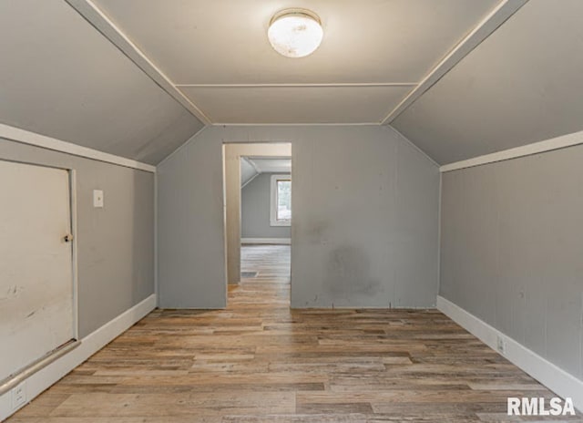 1507 4th St, Lincoln, IL 62656 - additional living space with wood finished floors and lofted ceiling