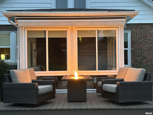 321 S 23rd St, Quincy, IL 62301 - wooden terrace with a fire pit