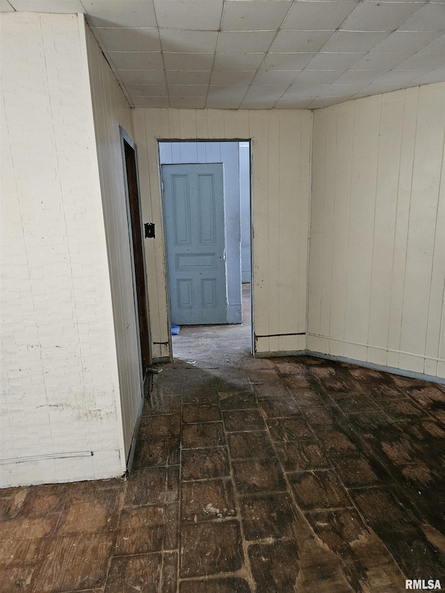 212 Chestnut St, Quincy, IL 62301 - unfurnished room featuring a paneled ceiling and brick patterned flooring