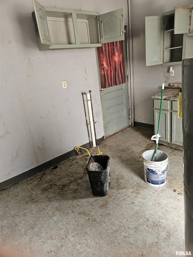 212 Chestnut St, Quincy, IL 62301 - garage featuring baseboards