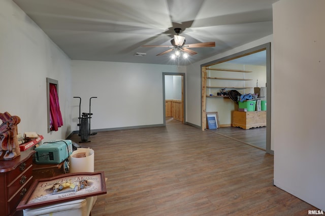 305 E Clay St, Pleasant Hill, IL 62366 - sitting room with ceiling fan, wood finished floors, and baseboards