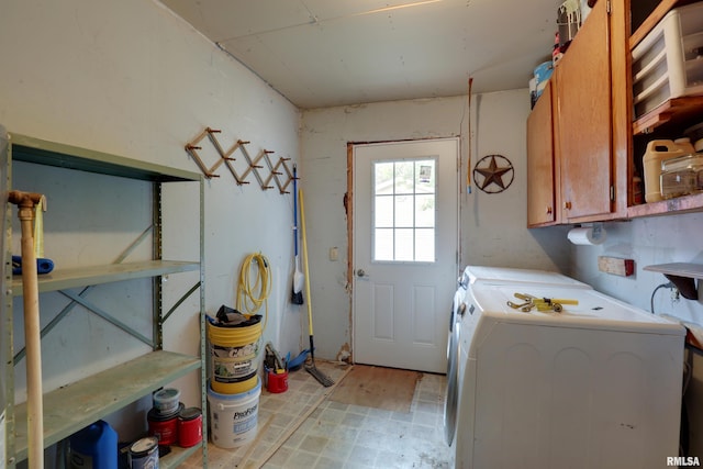 305 E Clay St, Pleasant Hill, IL 62366 - laundry room with cabinet space, washer and clothes dryer, and light flooring