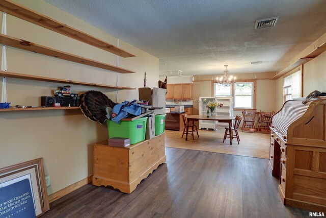 305 E Clay St, Pleasant Hill, IL 62366 - kitchen with a chandelier, dark wood finished floors, pendant lighting, and baseboards