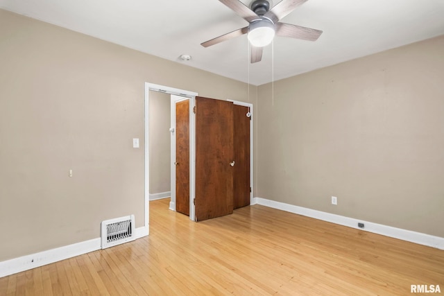 1622 W Cook St, Springfield, IL 62704 - unfurnished bedroom with light wood-type flooring, baseboards, and ceiling fan