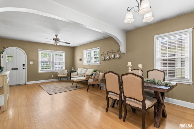 1622 W Cook St, Springfield, IL 62704 - dining area featuring a chandelier, light wood-style flooring, and baseboards