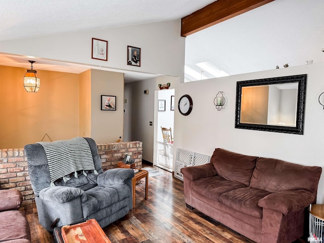1666 Outrigger Rd, Galesburg, IL 61401 - living room with vaulted ceiling and wood finished floors