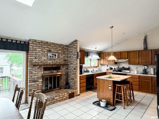 1666 Outrigger Rd, Galesburg, IL 61401 - kitchen featuring dishwasher, electric stove, vaulted ceiling, light countertops, and a brick fireplace